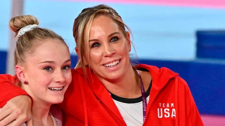 Maggie Haney (C)) coached many top gymnasts including 2018 world champion Riley McCusker (L)