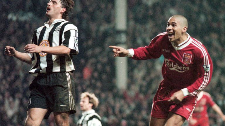 Stan Collymore celebrates after his dramatic winner as Newcastle players look dejected