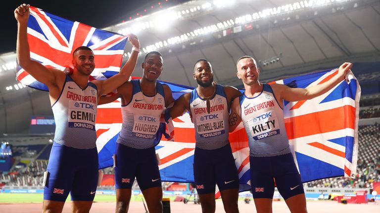 Adam Gemili, Zharnel Hughes, Richard Kilty and Nethaneel Mitchell-Blake of Great Britain celebrate silver in Doha