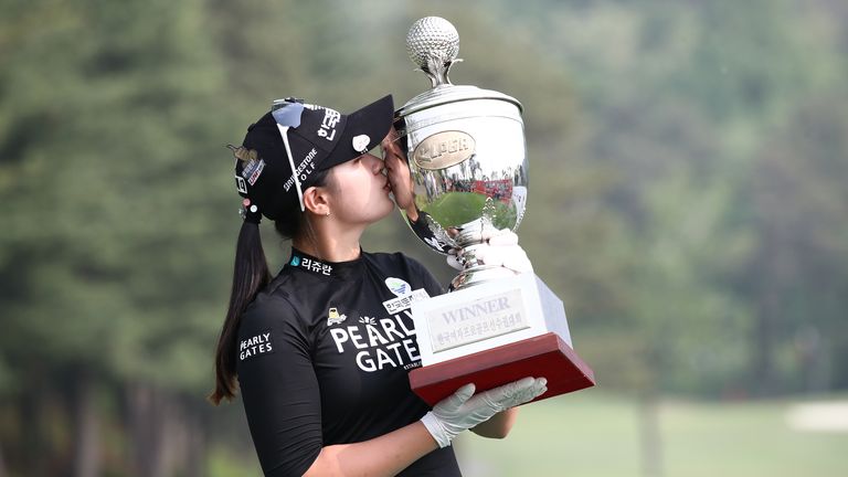 Hyun Kyung Park kissing the KLPGA Championship trophy after her victory