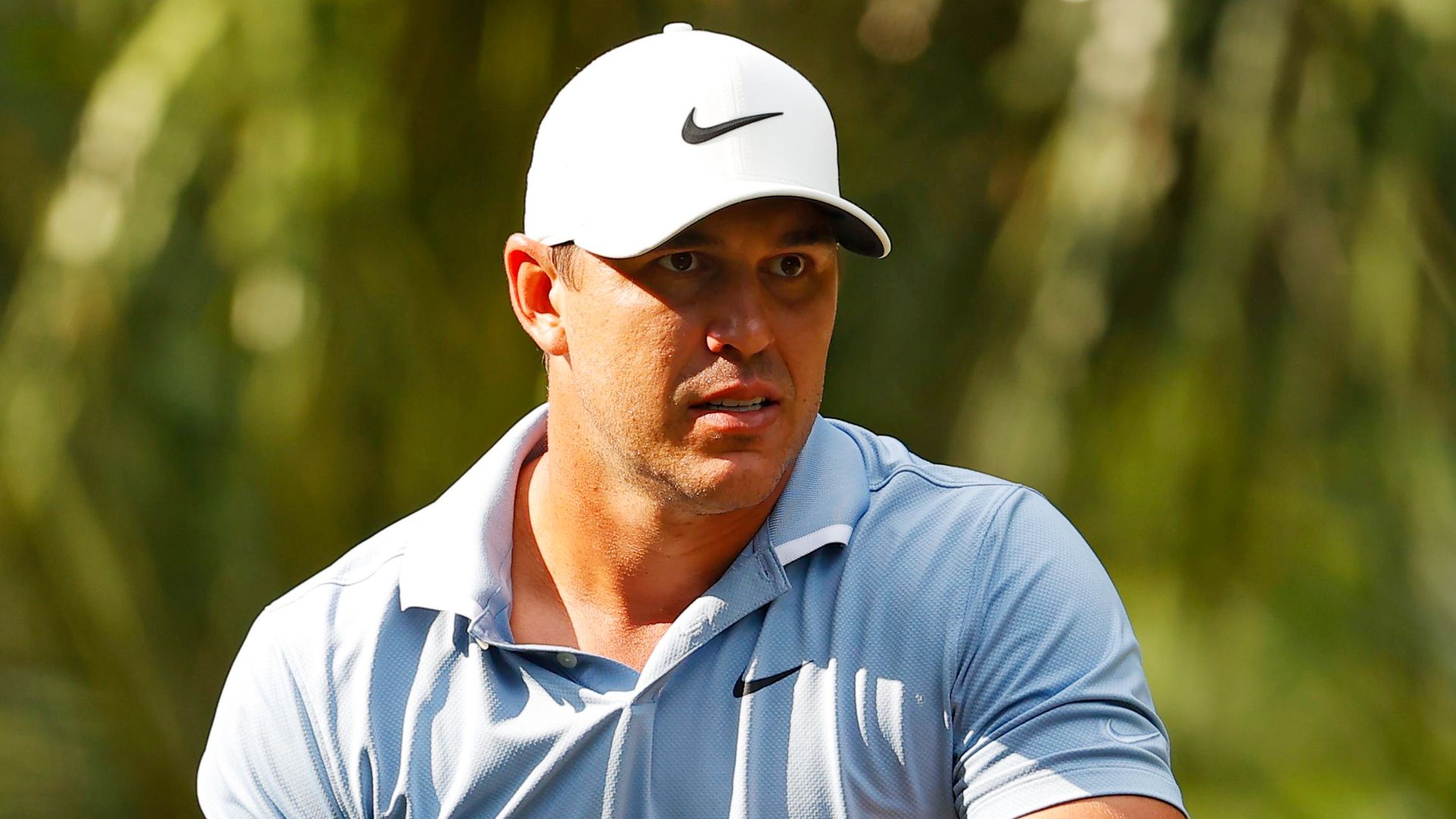 Koepka positive despite knee problem