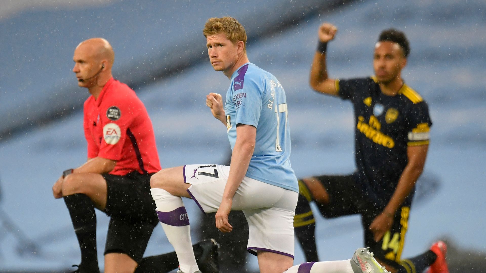 Players, officials take knee on PL restart