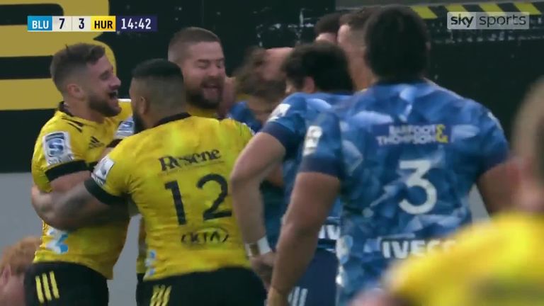 Dane Coles looks to get Beauden Barrett  involved in the 'Canes celebrations