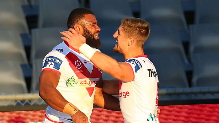 Mikaele Ravalawa  celebrates with Zac Lomax after scoring a try