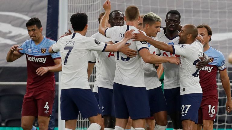 West Ham players look dejected as Tottenham celebrate