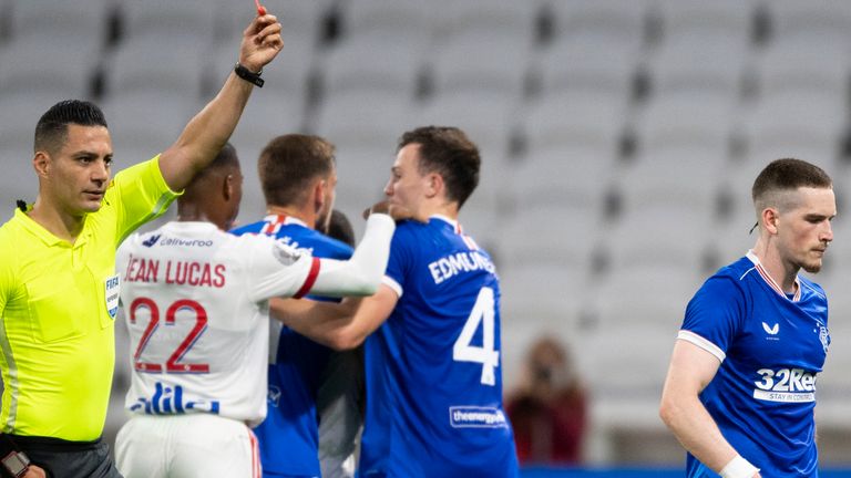 Kent leaves the pitch after being sent off in the win over Lyon