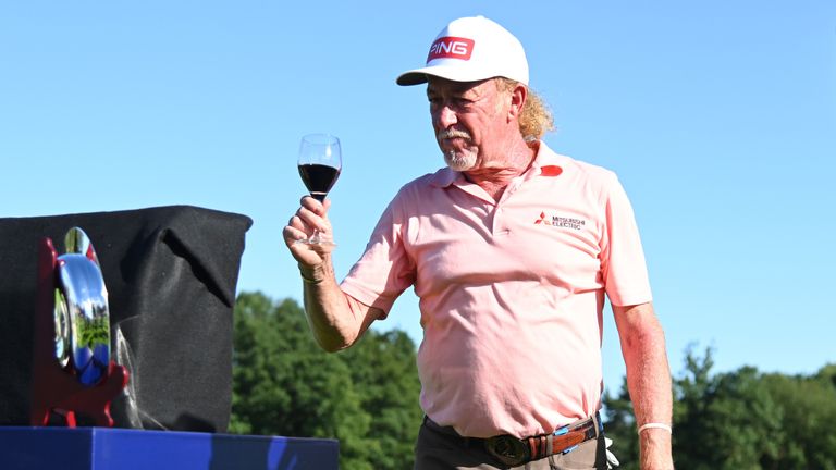 Jimenez celebrates with Sam Torrance and a glass of Rioja