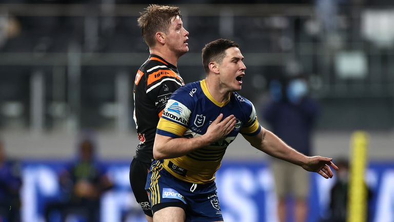 Mitchell Moses celebrates scoring for the Eels