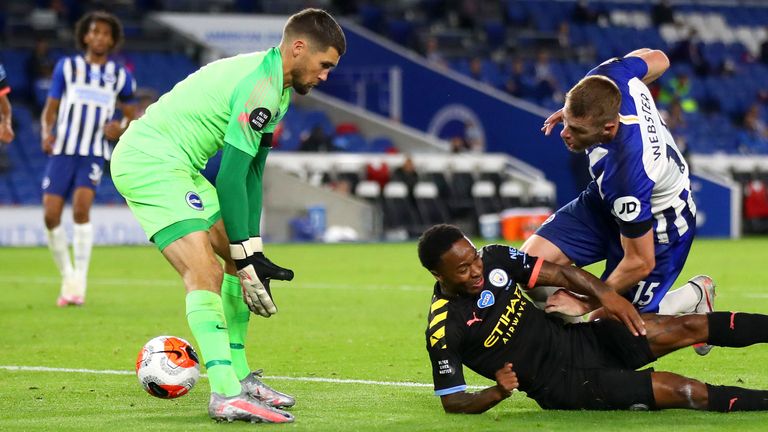 Sterling scores a header while laying on the ground