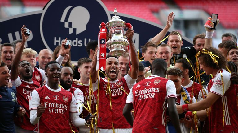 Arsenal captain Pierre-Emerick Aubameyang lifts the FA Cup at Wembley