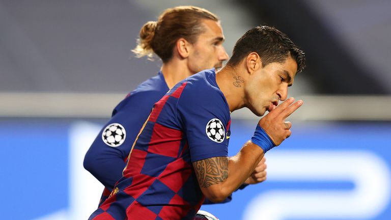 Luis Suarez celebrates his goal for Barcelona - but it was not enough to inspire a comeback