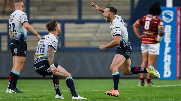 Luke Gale celebrates his winning drop goal