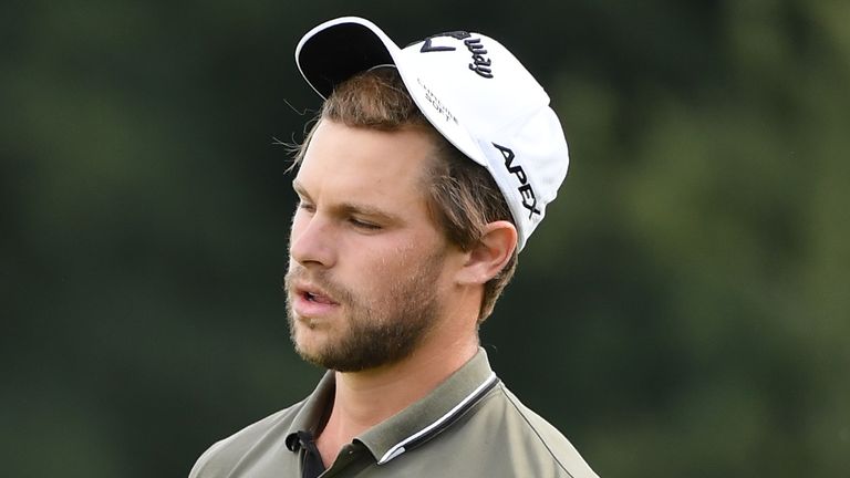 Thomas Detry reacts after missing his short par putt at the 18th