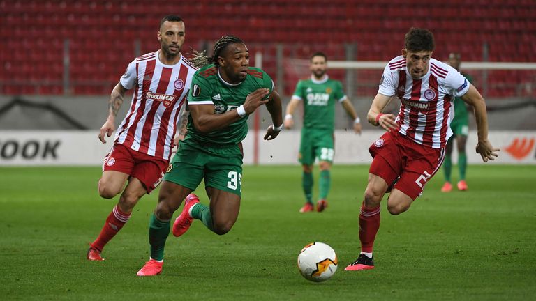 Tsimikas (r) was knocked out of the Europa League round of 16 by Wolves this week