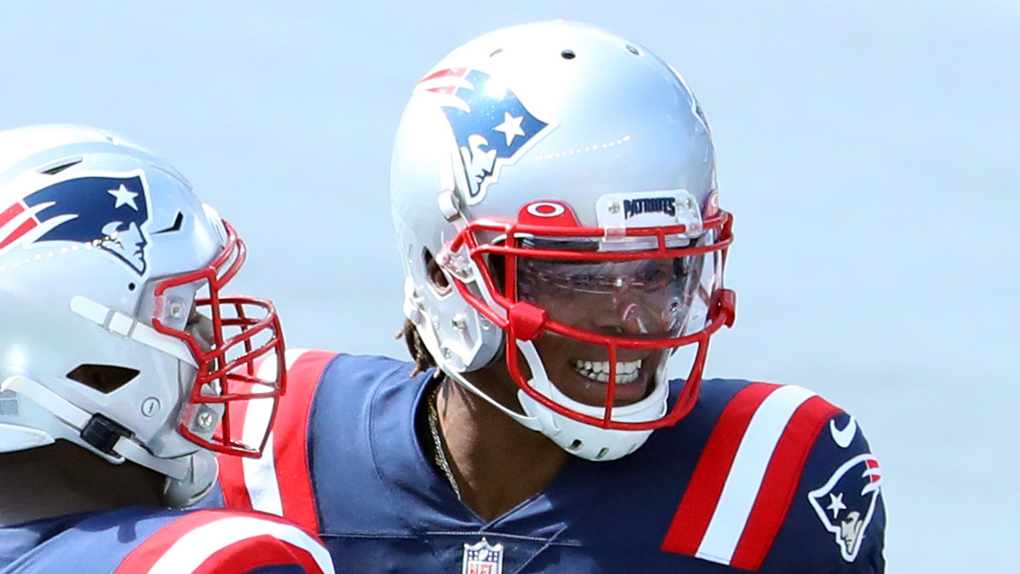 Newton runs for 2 TDs, leads team to victory in Patriots debut