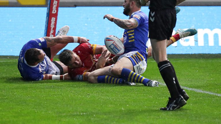 Davies scores despite the attentions of the Leeds defence