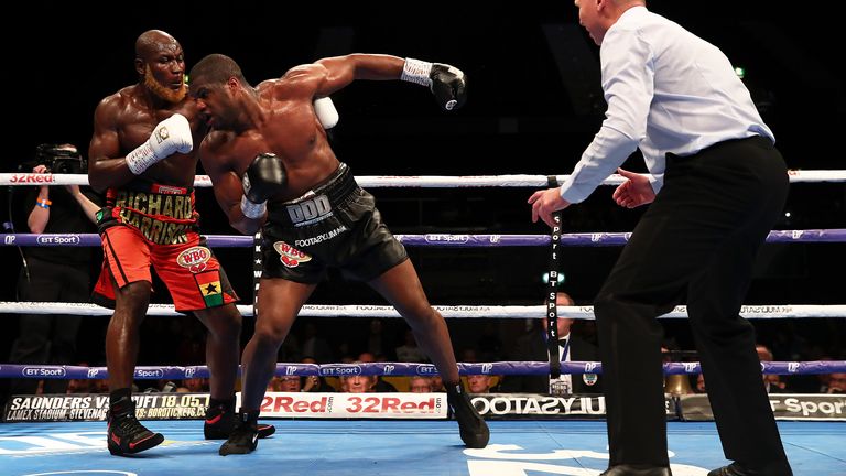 Dubois got into a reckless brawl before eventually beating Lartey