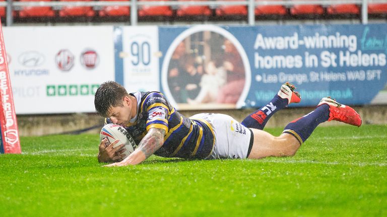 Tom Briscoe dives over for Leeds' first try