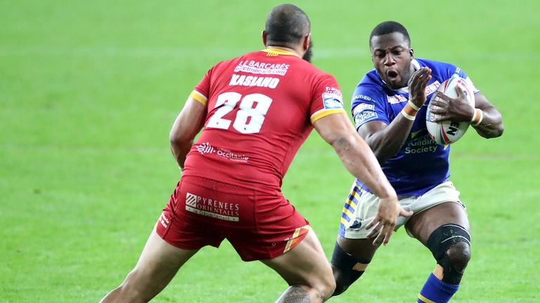 Muizz Mustapha tries to get past Catalans Dragons' Sam Kasiano