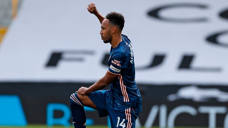 Pierre-Emerick Aubameyang takes a knee before kick-off at Craven Cottage