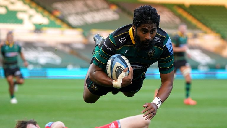 Ahsee Tuala dives over to score Northampton's first try