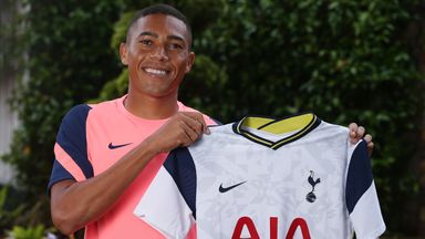 Image of Carlos Vinicius displays the Tottenham shirt after sealing his loan move