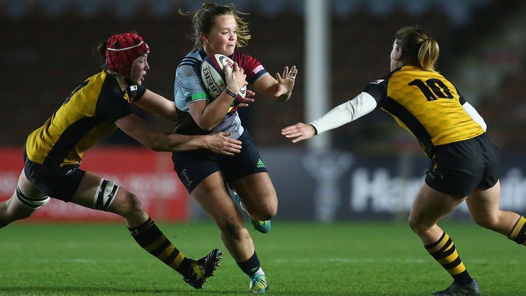 Harlequins' Ellie Green runs at the Wasps defence - the two sides will square off next week in the Premier 15s
