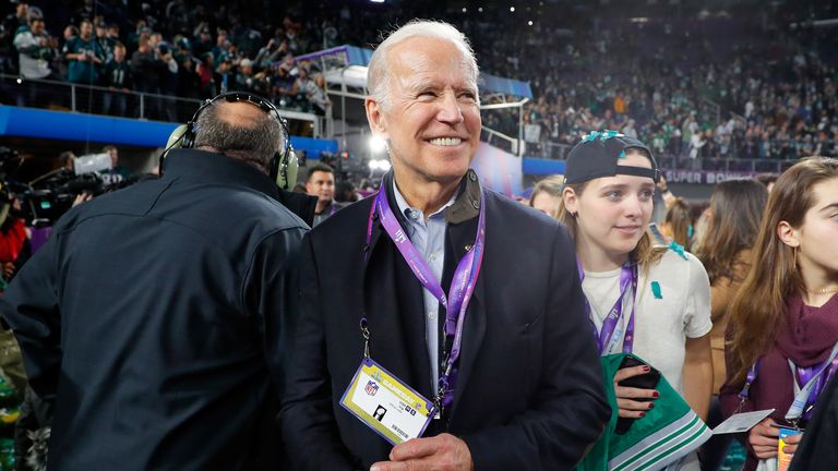 Joe Biden smiles after watching the Philadelphia Eagles win the Super Bowl in 2018