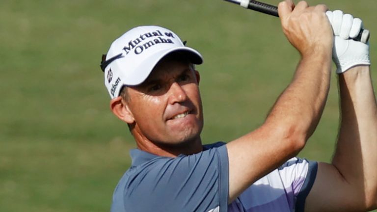 Padraig Harrington carded a 71 to stay four behind