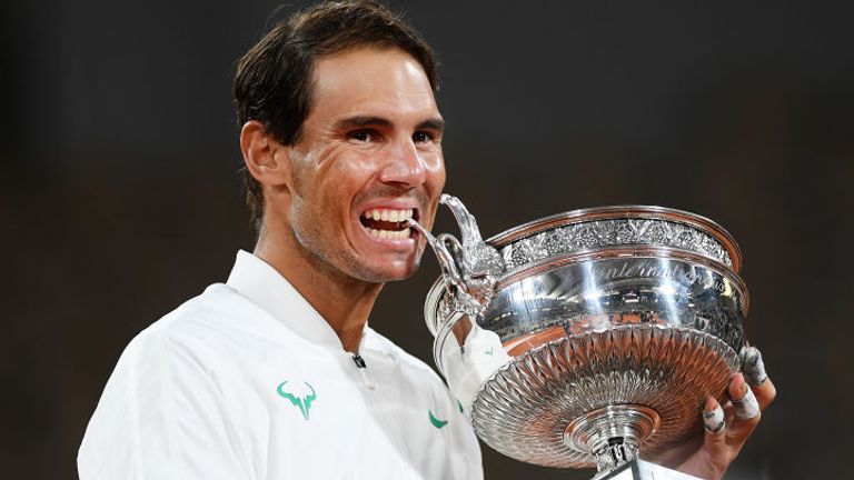 Rafael Nadal stormed a record 13th French Open title in Paris on Sunday