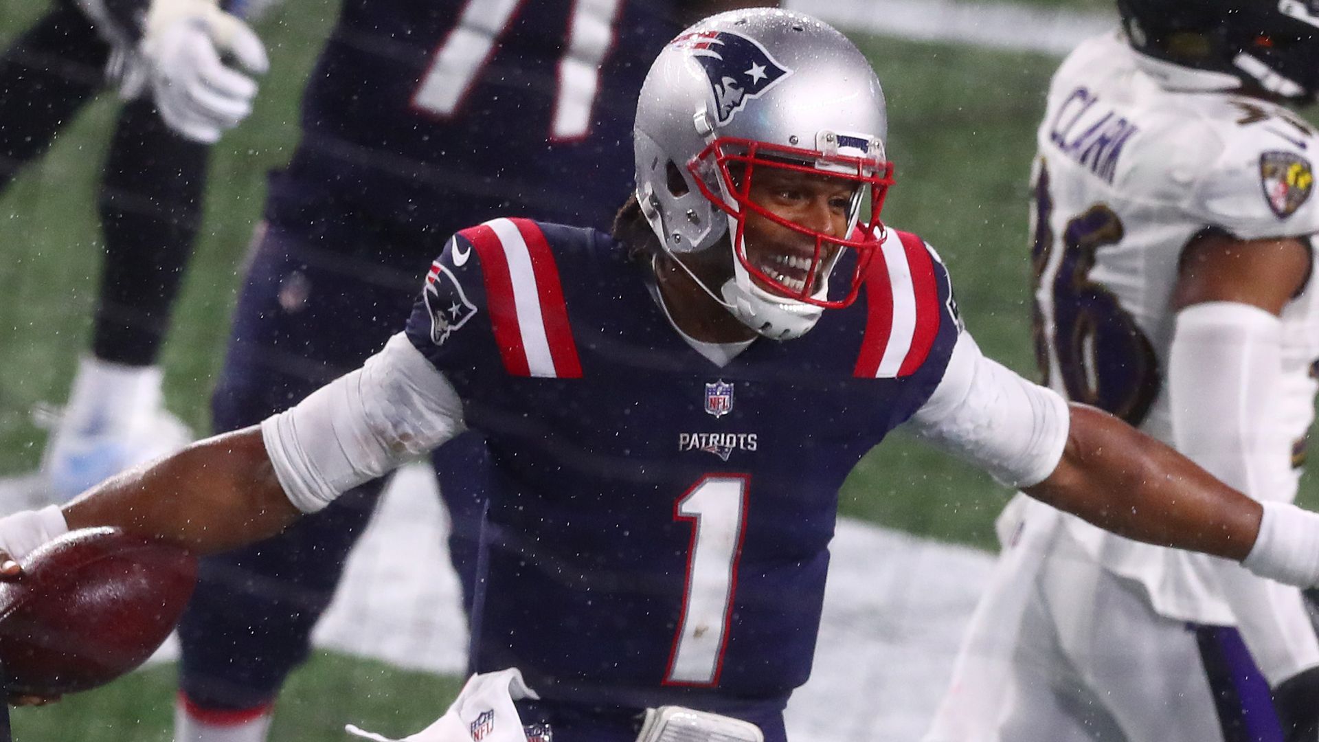 Newton's Patriots beat Ravens in heavy rain
