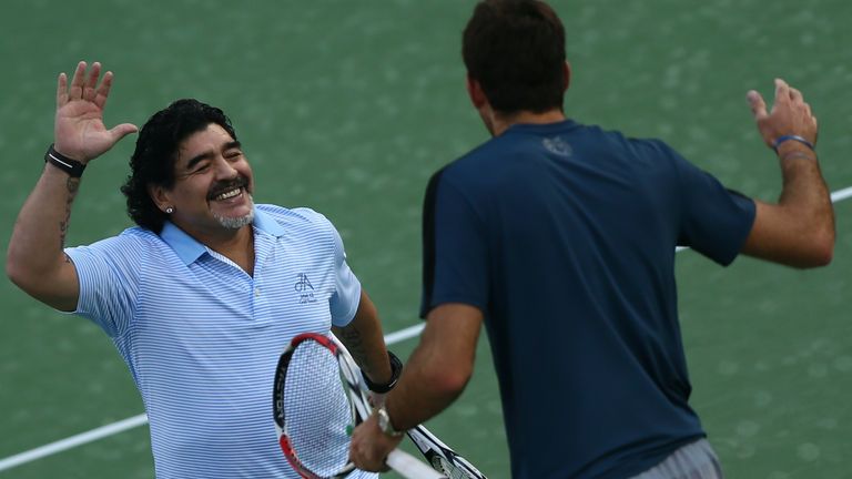 Football legend Diego Maradona (left) greets his fellow countryman Juan Martin del Potro in 2013