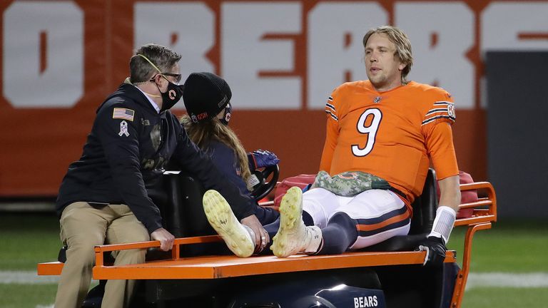 Nick Foles is carted off after injuring his hip against the Vikings in Week 10