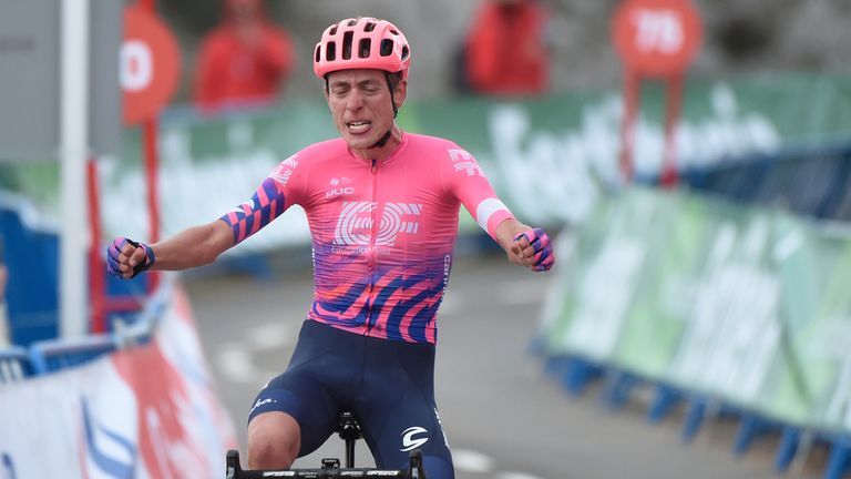 EF Pro Cycling's British rider Hugh Carthy celebrates as he crosses the finish line for a podium finish