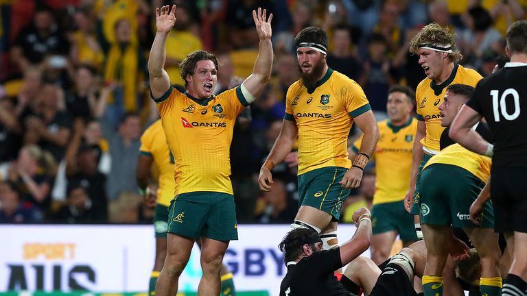 Michael Hooper celebrates in Brisbane.