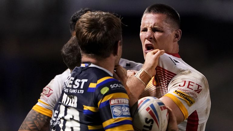 Richie Myler and Joel Tomkins clash during what was at times a feisty encounter