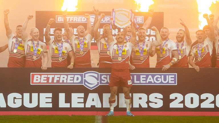 Wigan beat Huddersfield 19-6 to win their first League Leaders Shield in eight years.