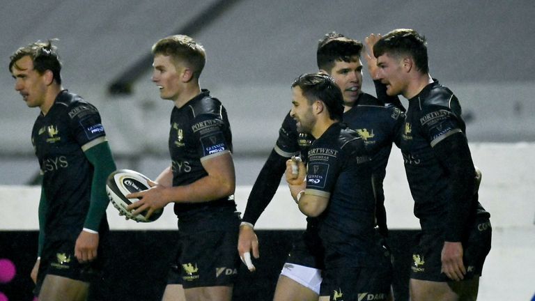 Alex Wootton celebrates with team-mates after scoring Connacht's third try