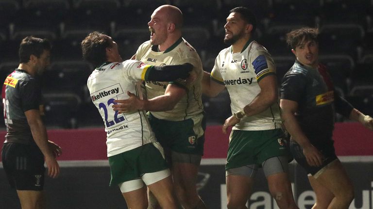 Oliver Hoskins celebrates scoring his side's bonus-point try