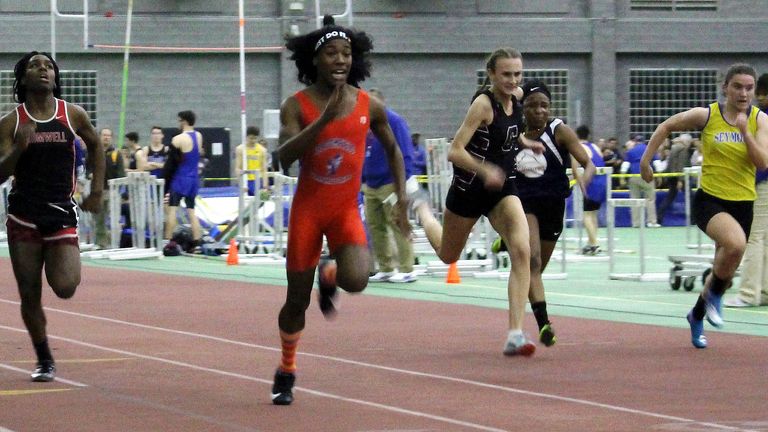 Bloomfield High School transgender athlete Terry Miller, second from left, wins the final of the 55-meter dash over trans athlete Andraya Yearwood, far left, at a Connecticut high school championship indoor track meet in February 2019