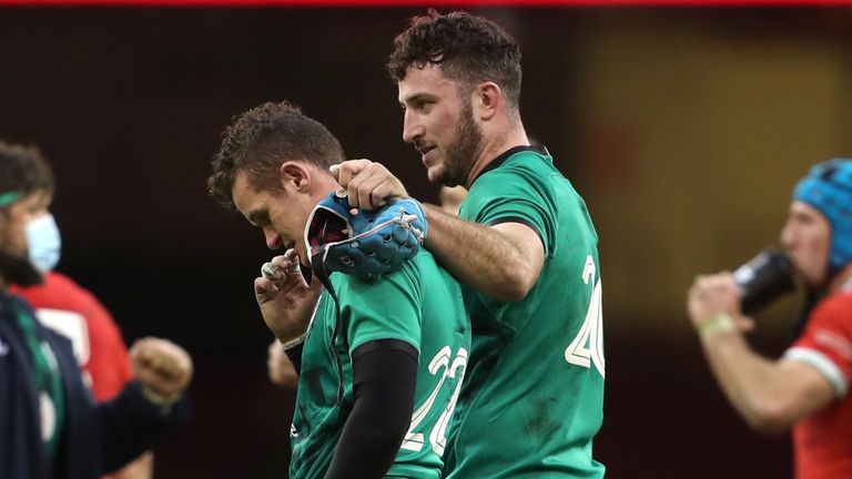 Billy Burns is consoled by Will Connors at full-time against Wales