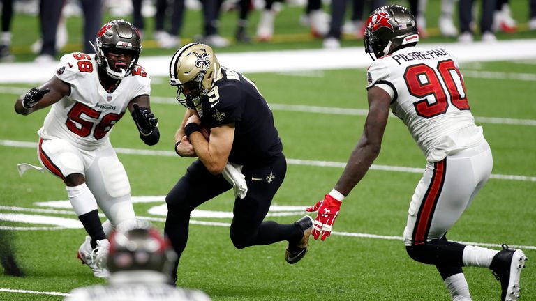 Shaquil Barrett (58) and Jason Pierre-Paul (90) bring the heat off the edge