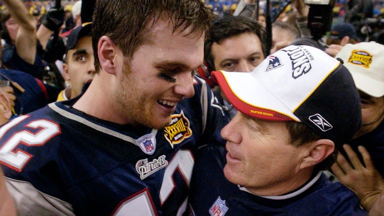 Tom Brady and Patriots head coach Bill Belichick celebrate their Super Bowl XXXVIII win over Carolina