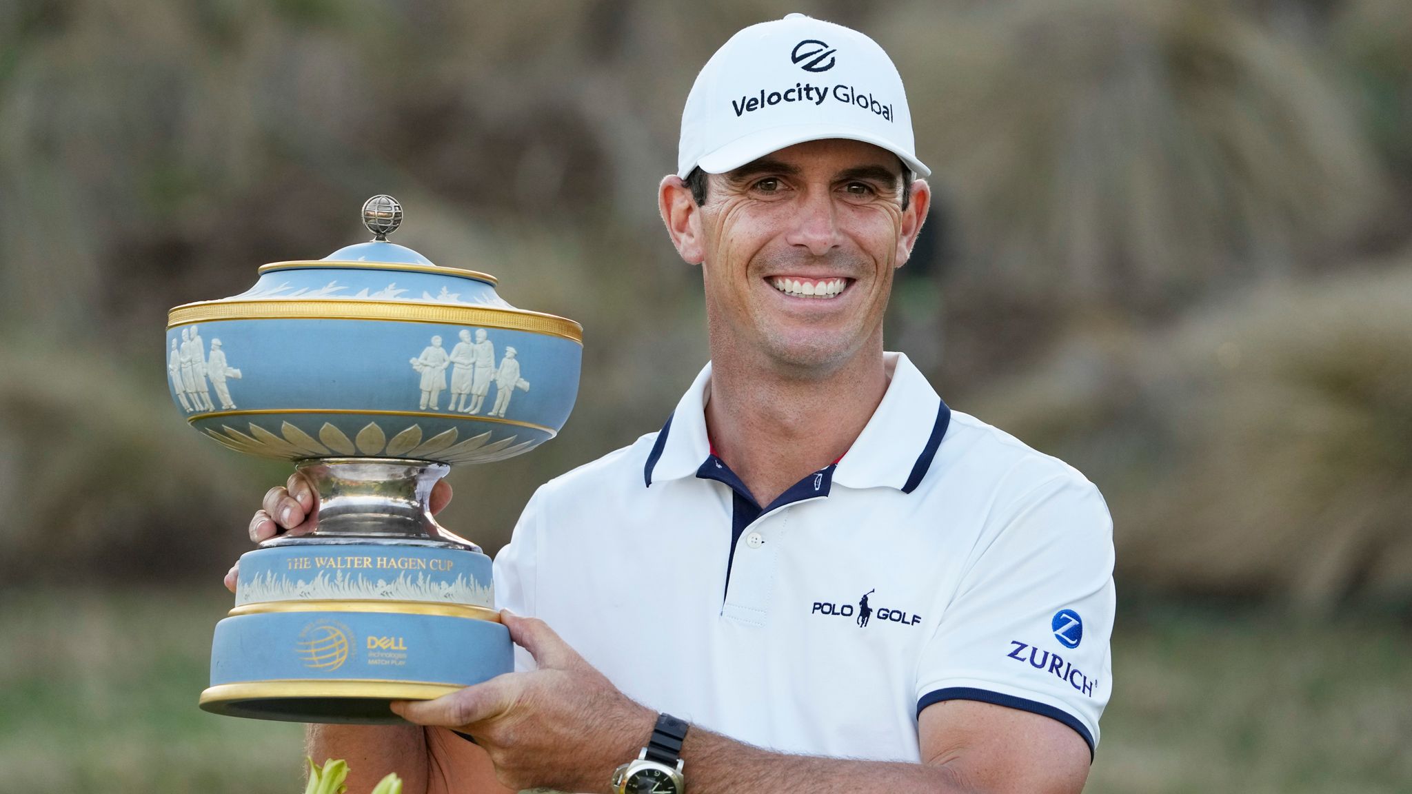 Billy Horschel picks up golf ball with putter in a never-before