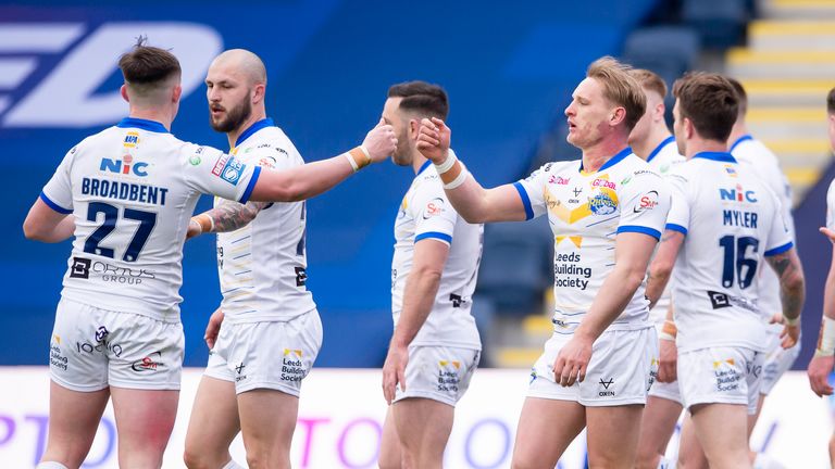 Leeds's Brad Dwyer is congratulated on his try against Wakefield.