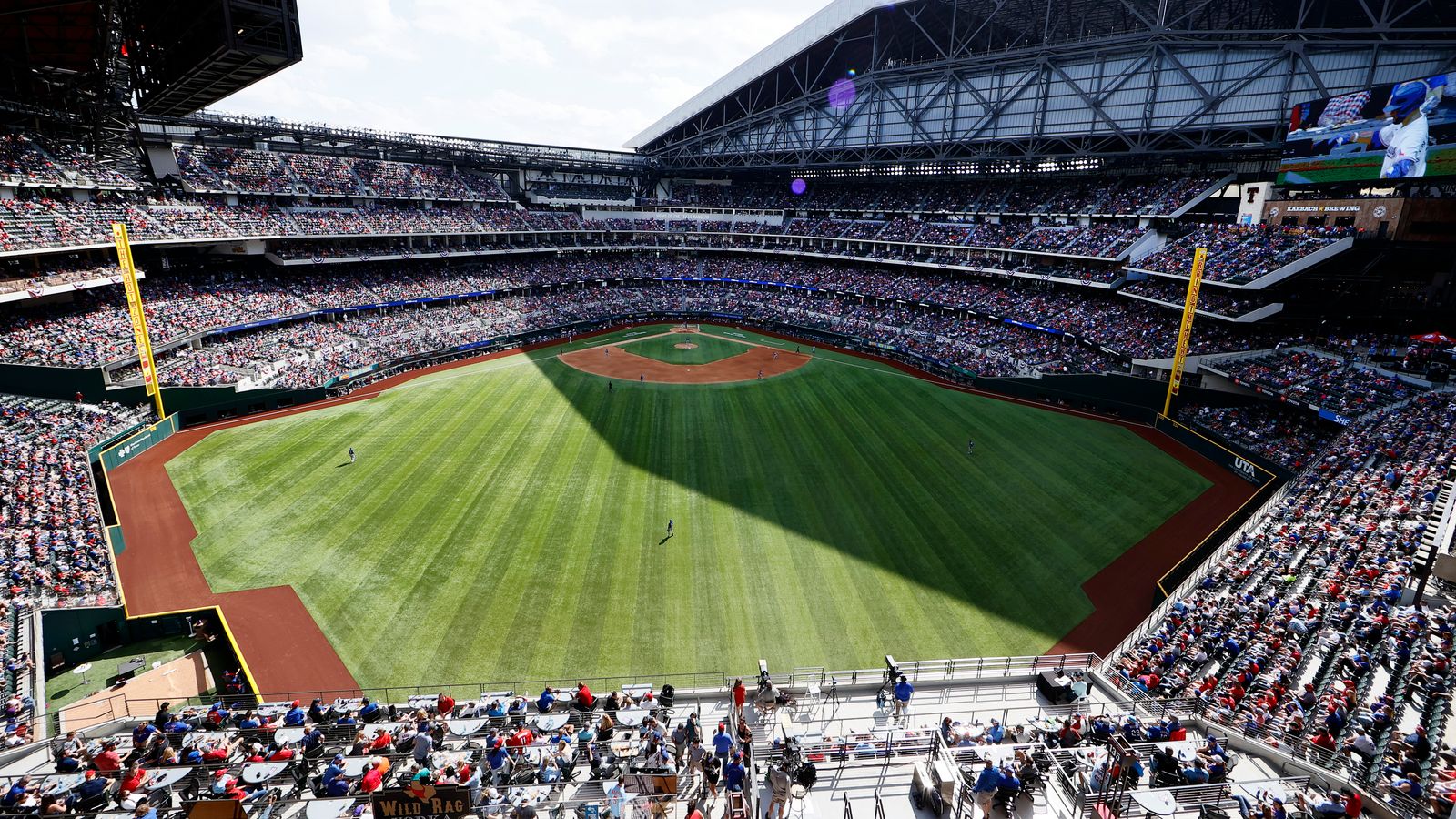 The new Texas Rangers stadium is completely air-conditioned with ammonia.  this is a seriously impressive building with a completely retractable roof.  I have never watched baseball so comfortable at like 70°. when