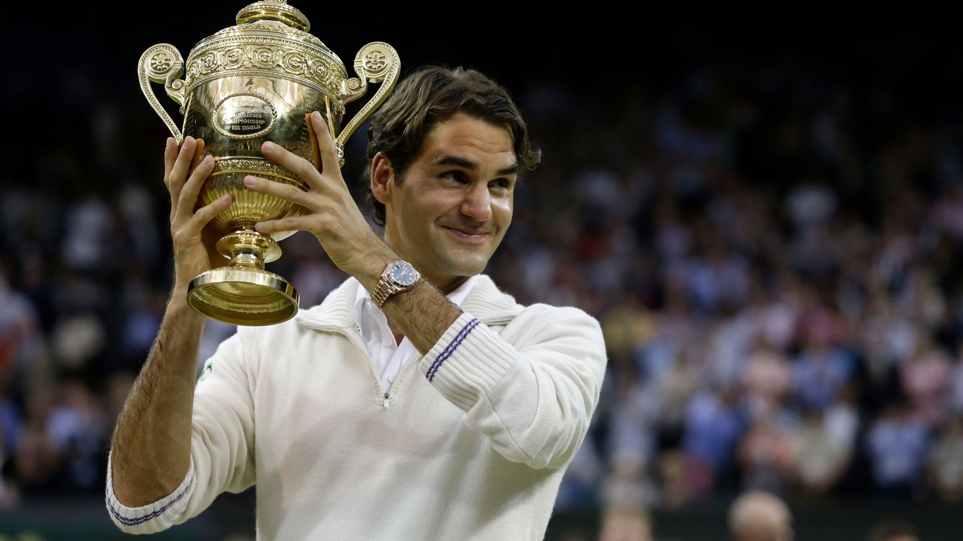 Federer to auction off Grand Slam memorabilia