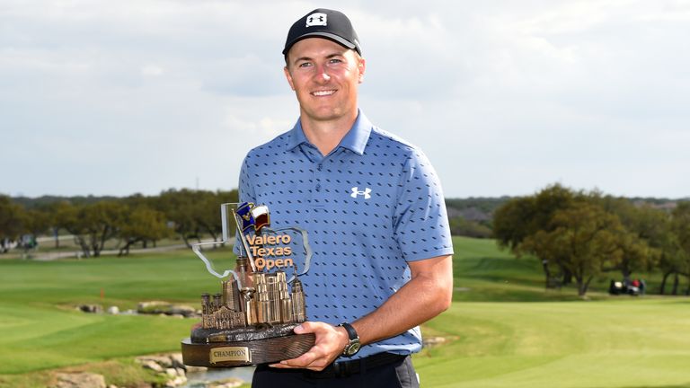 Spieth poses with a trophy for the first time since July 2017 after winning the Valero Texas Open