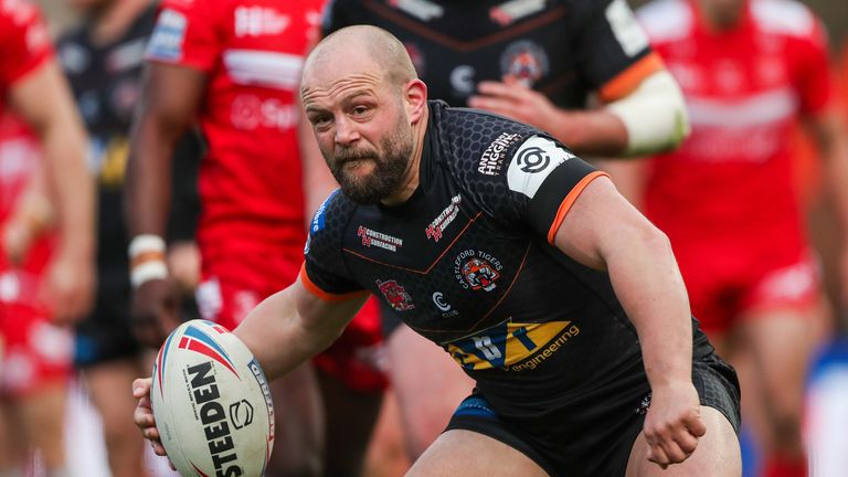 Castleford's Paul McShane celebrates scoring a try.