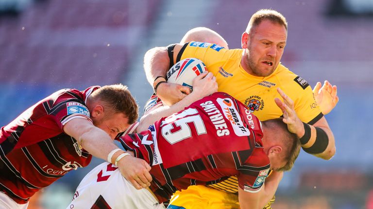 Wigan Warriors beat Castleford Tigers 22-12 on their return to the DW Stadium to remain unbeaten in Super League